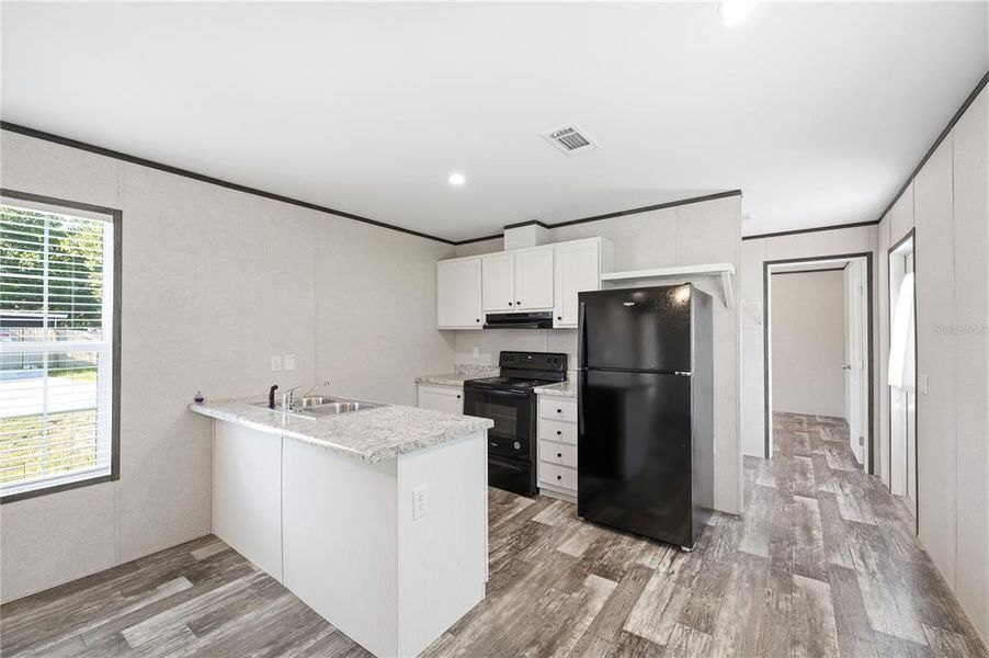 Furnished interior view inside a new home in , Brooksville (Image 8).