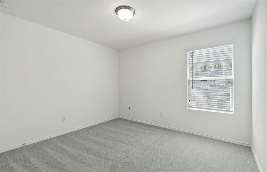 Spacious secondary bedroom*real home pictured