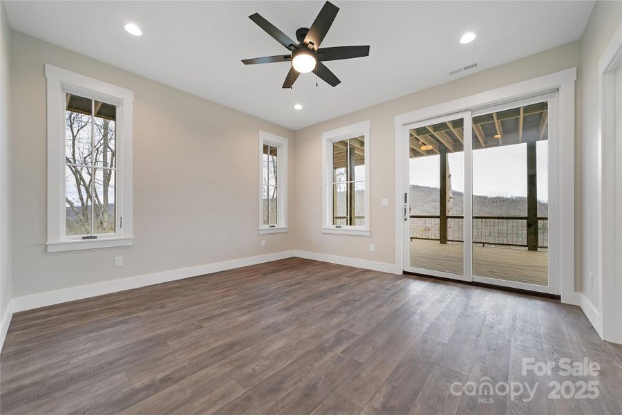 Spacious, unfurnished interior of a new home in , Pisgah Forest (Image 33).