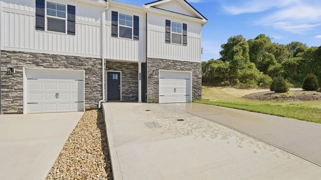 Front exterior of a new home in The Arbor Townhomes, Kingsport, TN, highlighting curb appeal (Image 15).