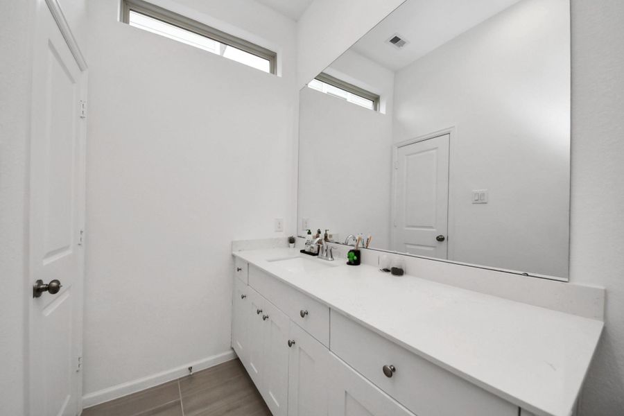 Furnished interior view inside a new home in The Trails, New Caney (Image 12).