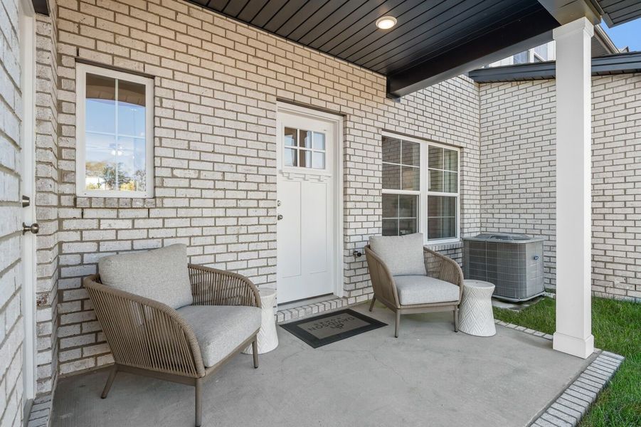 Exterior details and patio area of a home in The Towns at Red River, Gallatin (Image 4).