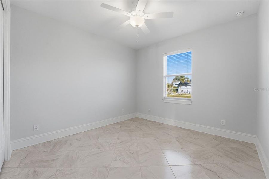 Spacious, unfurnished interior of a new home in , Port Charlotte (Image 37).
