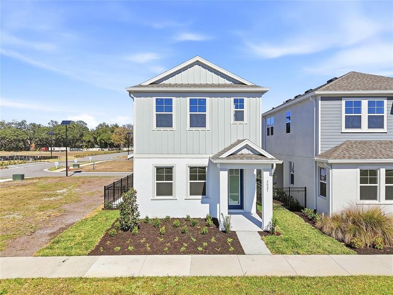 Front exterior of a new home in , Valrico, FL, highlighting curb appeal (Image 24).