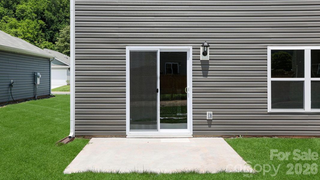 Exterior details and patio area of a home in Wildbrook Village, Waynesville (Image 19). Exterior details and patio area of a home in Wildbrook Village, Waynesville (Image 19).