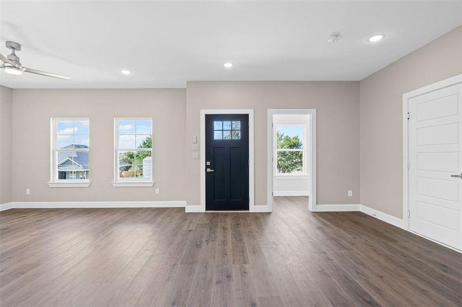 Entryway with recessed lighting, dark wood-style flooring, and a ceiling fan Entryway with recessed lighting, dark wood-style flooring, and a ceiling fan