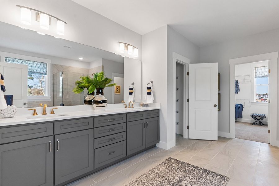 Representative furnished interior of a home built from the The Hampton by RobuckHomes in Windwater, Hampstead (Image 13).