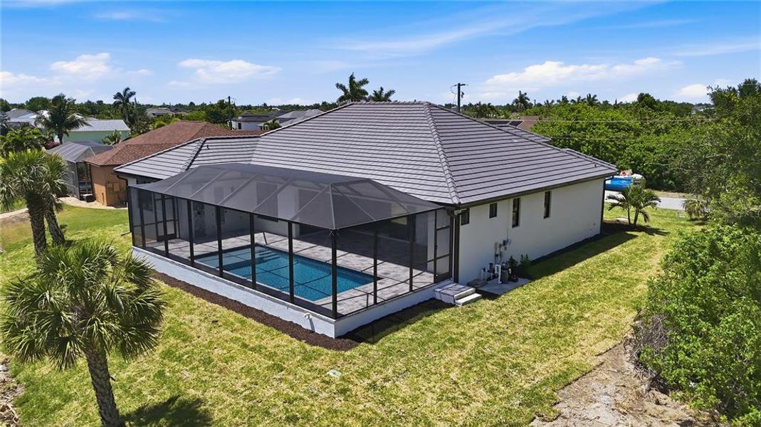 Exterior details and patio area of a home in , Port Charlotte (Image 22).
