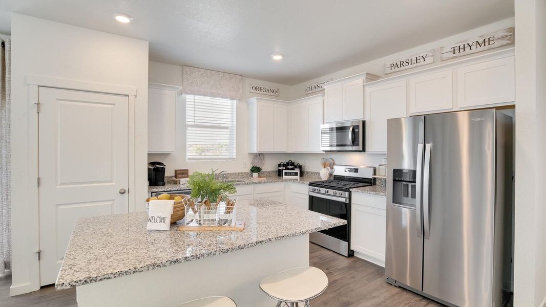 Furnished interior view inside a new home in The Ridge at Lorson Ranch, Colorado Springs (Image 9).