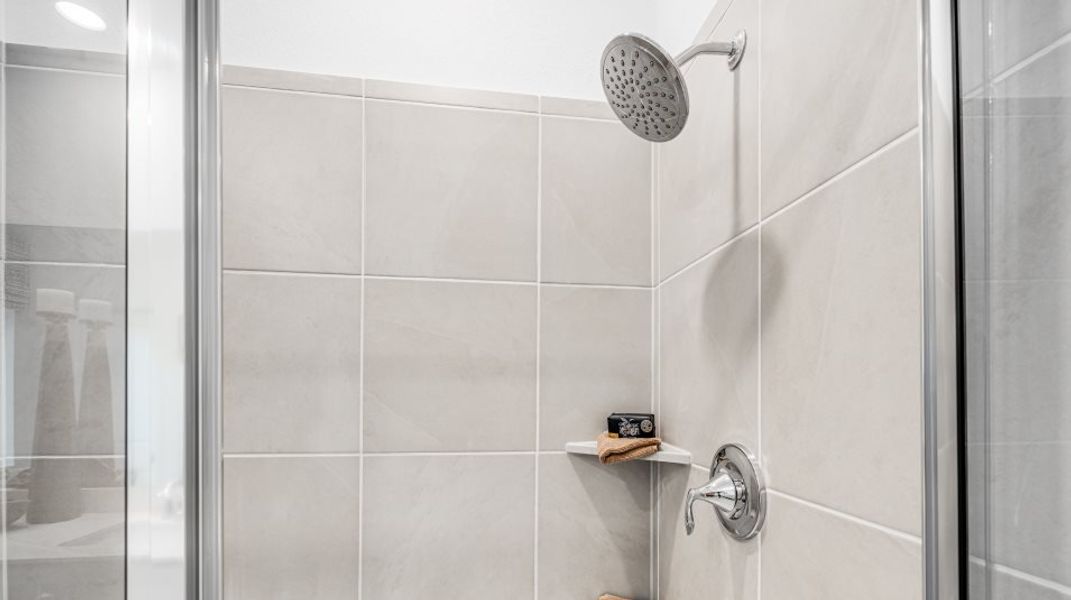 Walk-in shower with tile surround