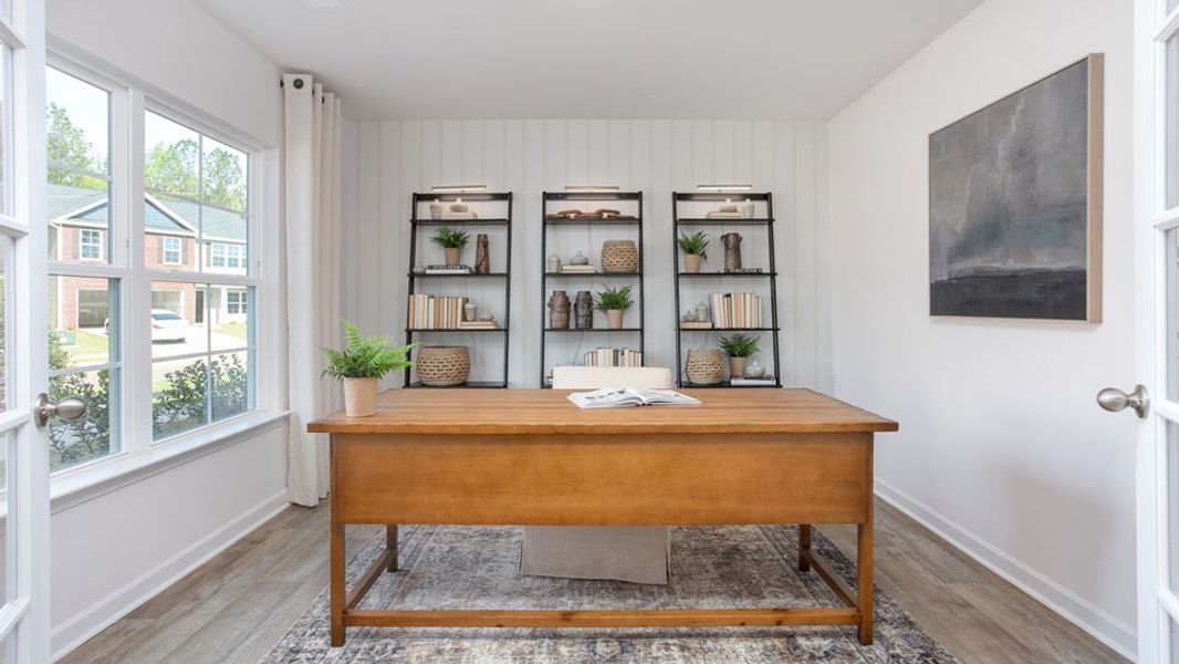 Representative furnished interior of a home built from the HAYDEN by D.R. Horton in River's Edge, Mayodan (Image 26).