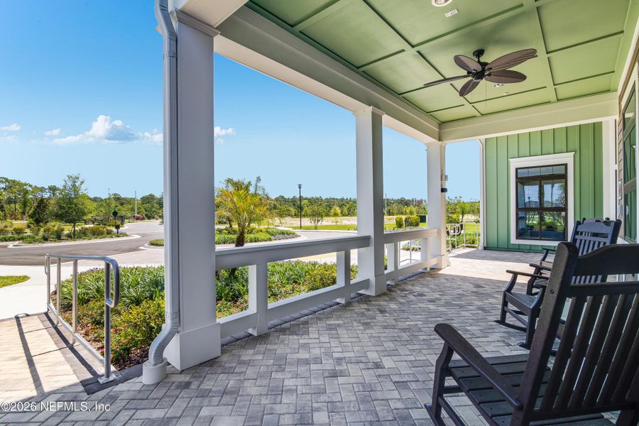 Exterior details and patio area of a home in Edenbrooke at Hyland Trail | 55+, Green Cove Springs (Image 15).