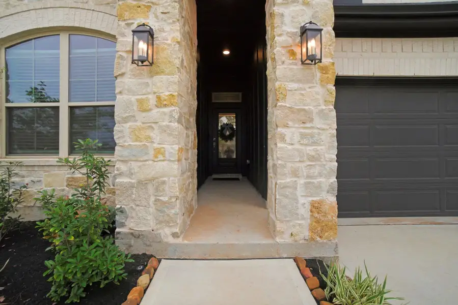 Exterior details and patio area of a home in , Willis (Image 23).