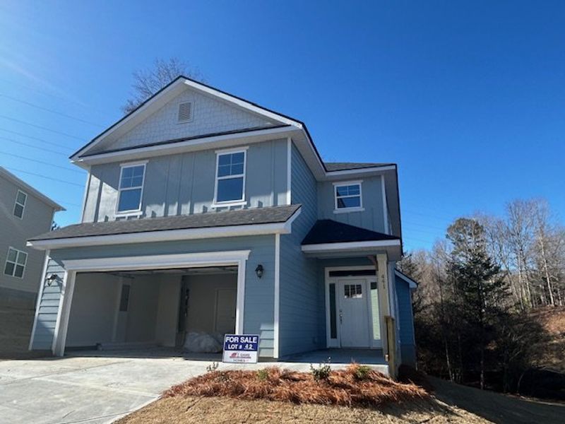 Front exterior of a new home in Habersham Meadows, Demorest, GA, highlighting curb appeal (Image 1). Front exterior of a new home in Habersham Meadows, Demorest, GA, highlighting curb appeal (Image 1).