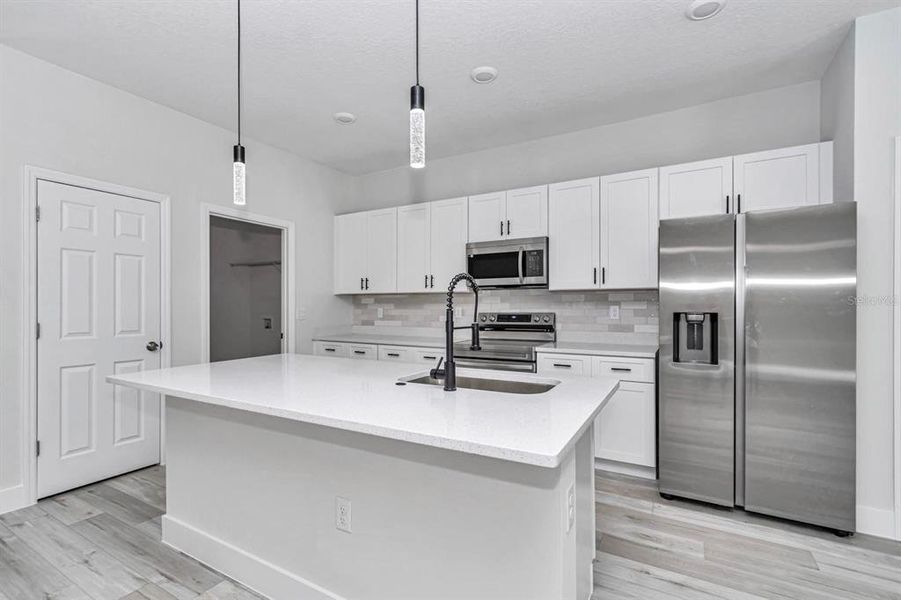 Furnished interior view inside a new home in , Poinciana (Image 10). Furnished interior view inside a new home in , Poinciana (Image 10).