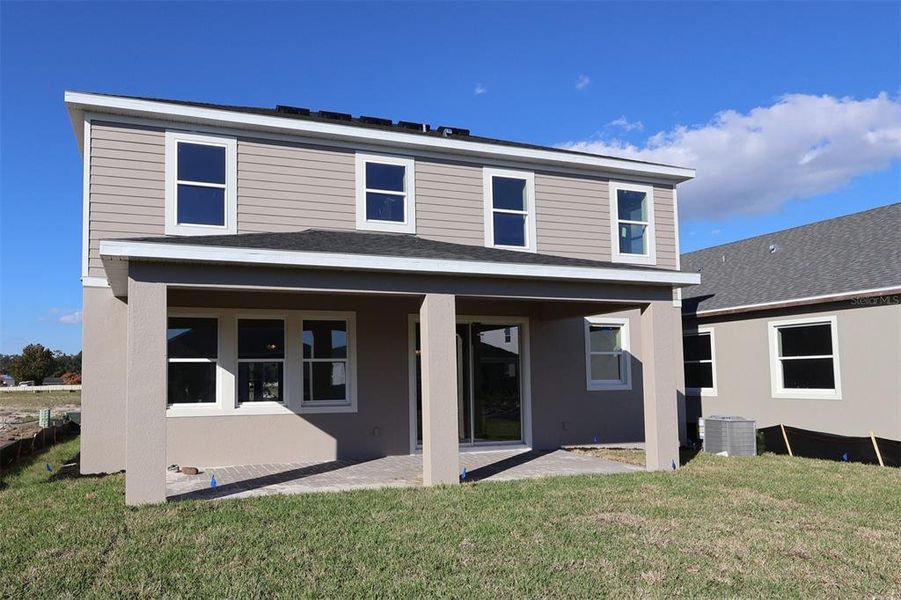 Exterior details and patio area of a home in Center Lake on the Park, St. Cloud (Image 16).
