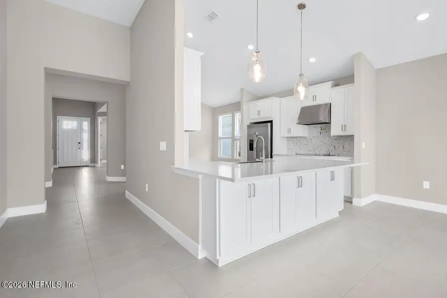 Furnished interior view inside a new home in Colbert Landings, Palm Coast (Image 3).