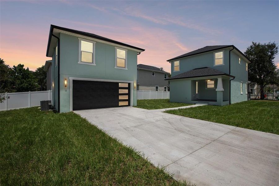 Front exterior of a new home in , Tampa, FL, highlighting curb appeal (Image 25).