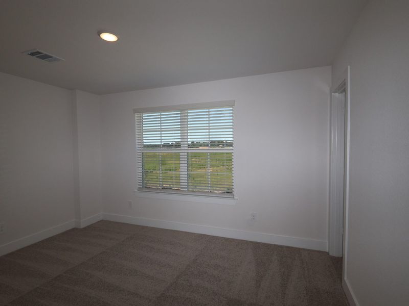 Spacious, unfurnished interior of a new home in Sorella, Tomball (Image 19).
