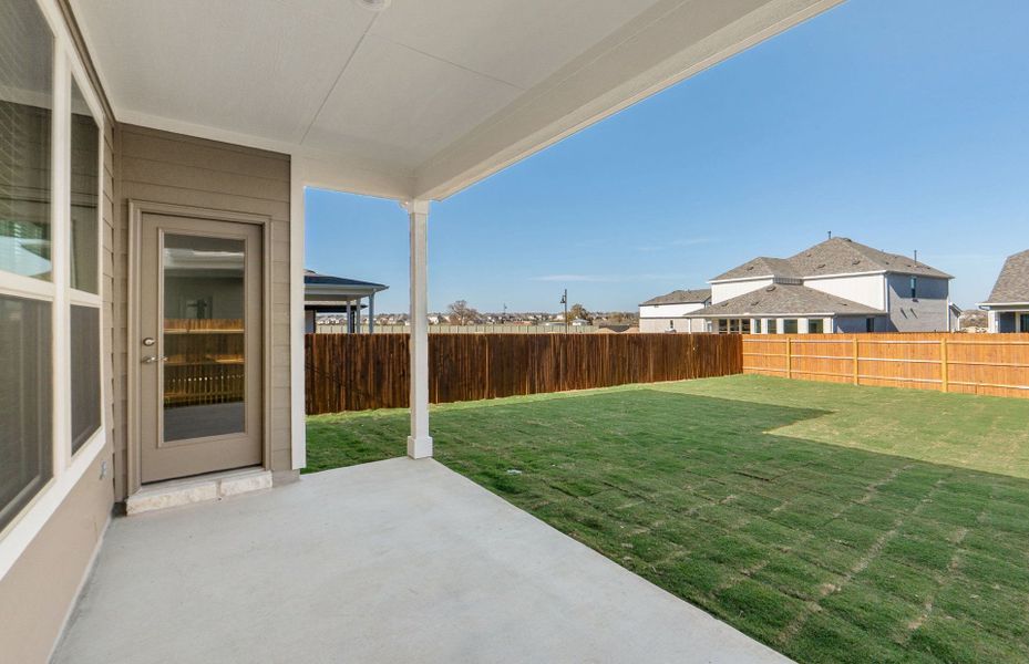Exterior details and patio area of a home in Santa Rita Ranch, Liberty Hill (Image 4).