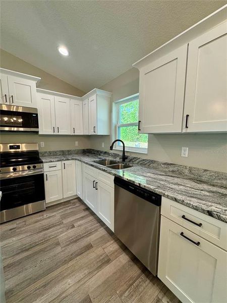 Furnished interior view inside a new home in , Dunnellon (Image 6).
