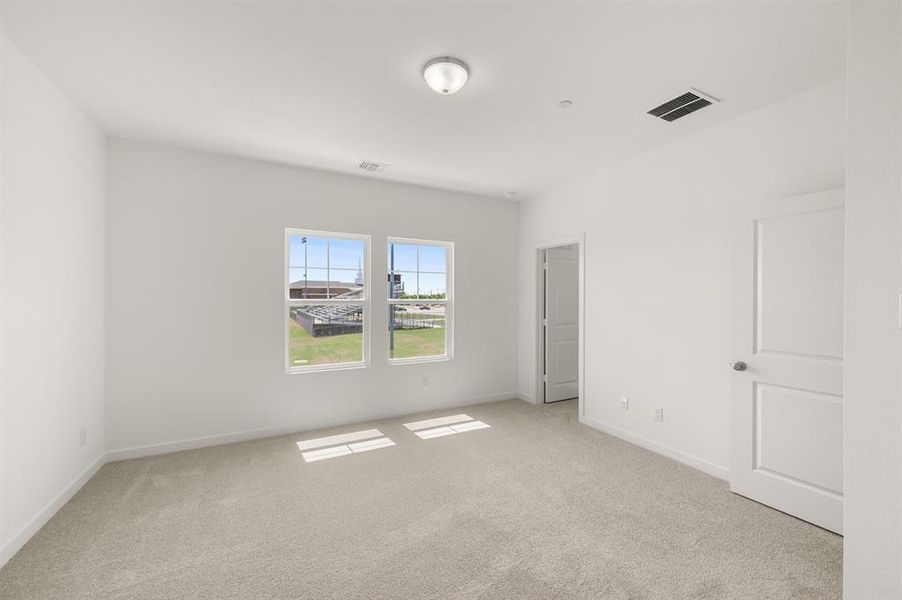 Spacious, unfurnished interior of a new home in The Pointe at Capp Smith Lake, Watauga (Image 30).