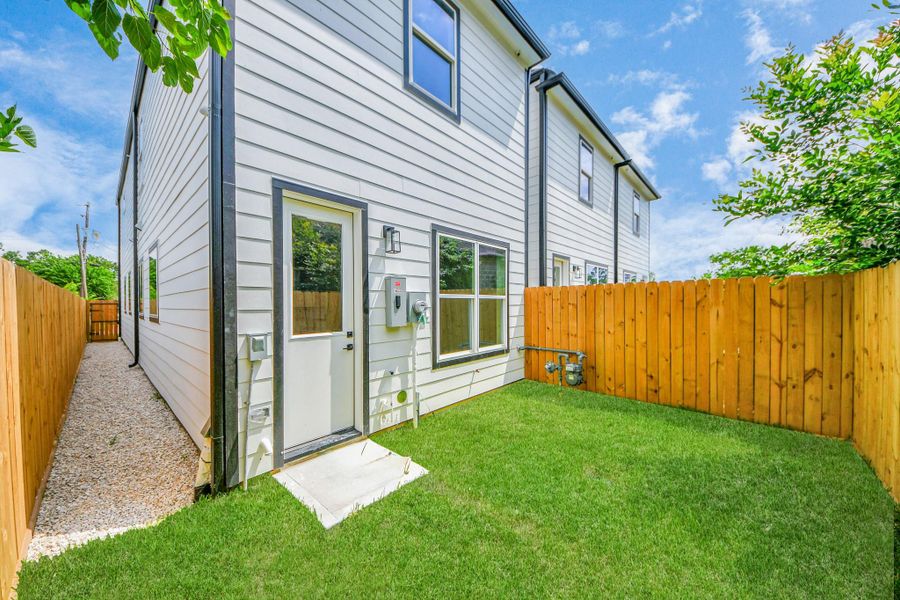 Exterior details and patio area of a home in , Houston (Image 3).