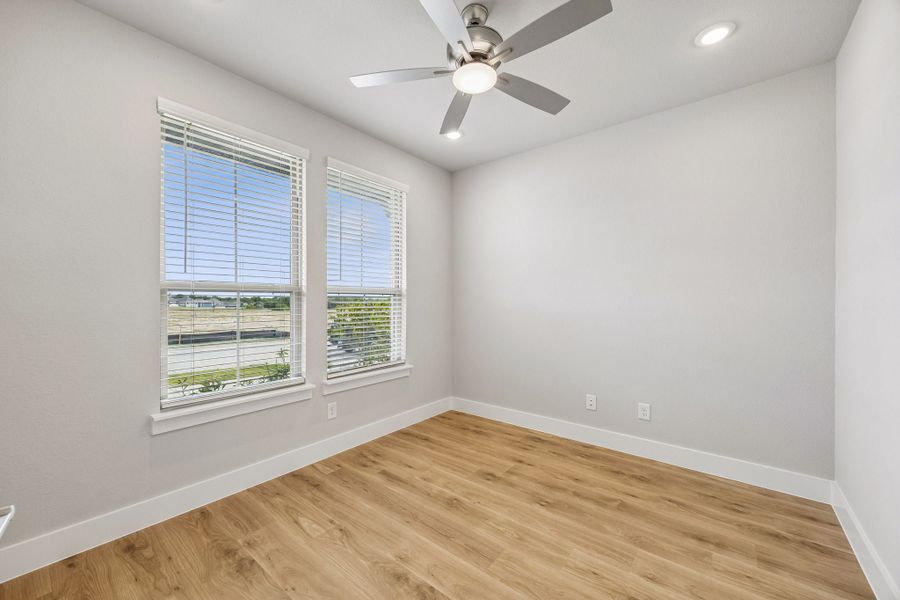 Spacious, unfurnished interior of a new home in Painted Tree Woodland West, McKinney (Image 28).