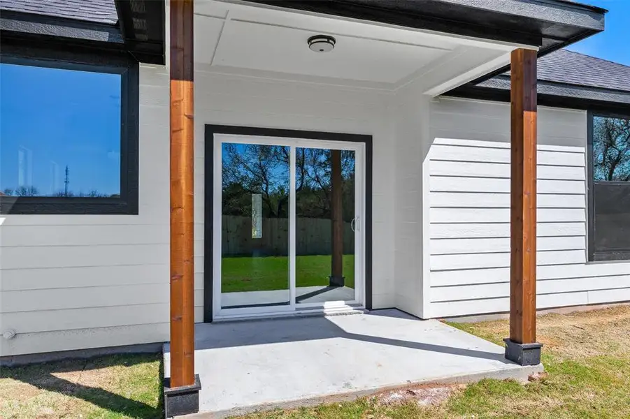 Exterior details and patio area of a home in , Granbury (Image 27).