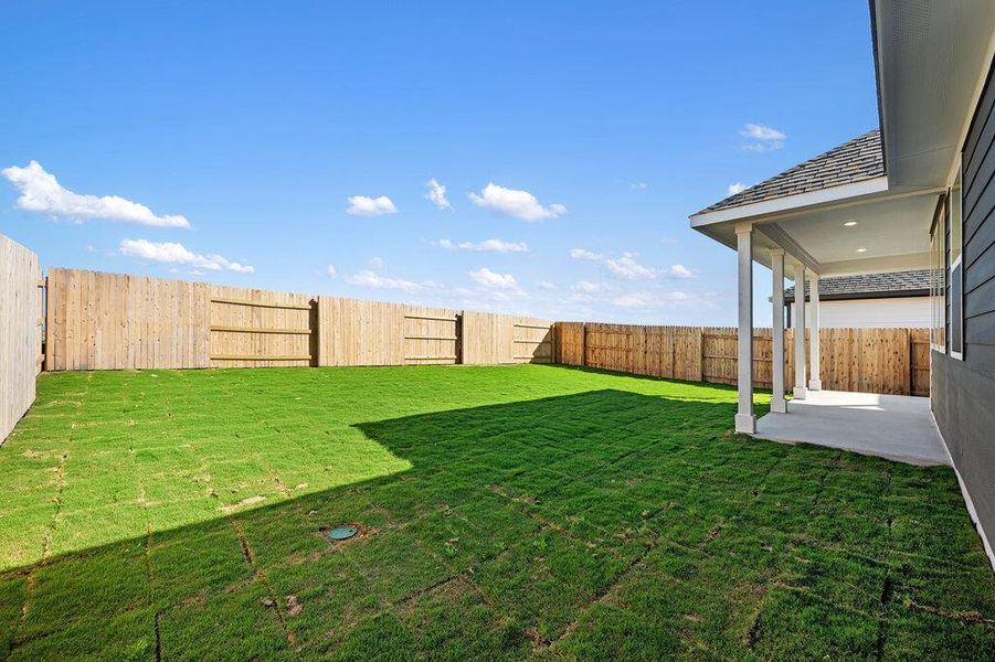 Exterior details and patio area of a home in Patterson Ranch, Georgetown (Image 25).