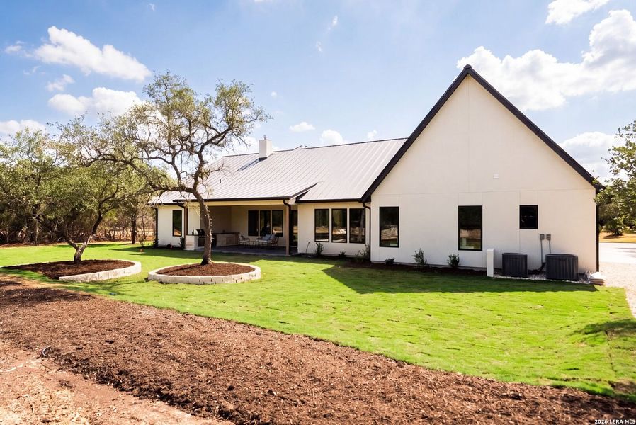 Exterior details and patio area of a home in , Boerne (Image 30).
