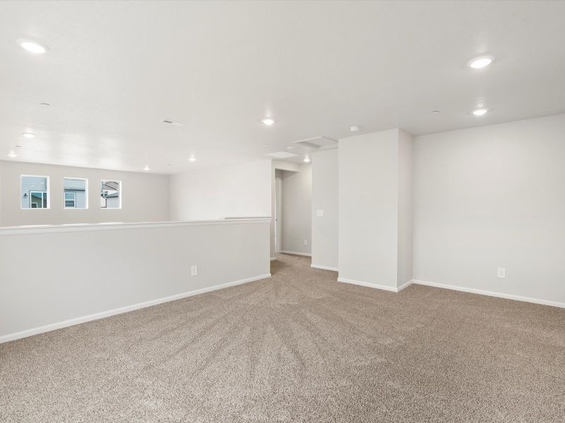 Spacious, unfurnished interior of a new home in Buffalo Highlands: The Flora Collection, Commerce City (Image 14).