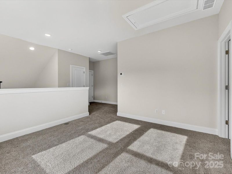 Spacious, unfurnished interior of a new home in North Creek Village, Huntersville (Image 29).