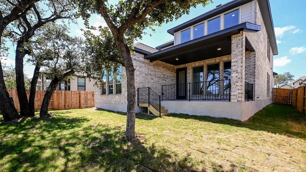 Exterior details and patio area of a home in 6 Creeks, Kyle (Image 19).