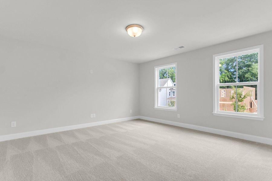 Spacious, unfurnished interior of a new home in Sweetgrass Station, Summerville (Image 24).