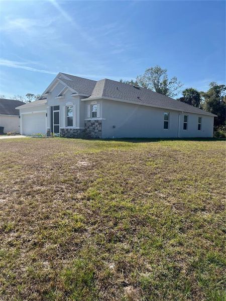 Exterior details and patio area of a home in , North Port (Image 23).