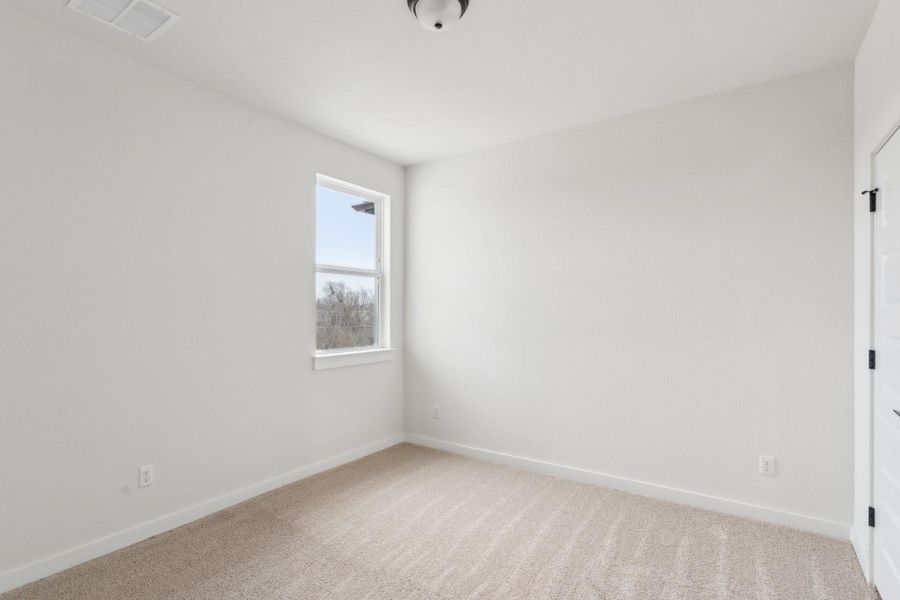 Spacious, unfurnished interior of a new home in Townhomes at Gattis, Round Rock (Image 25).