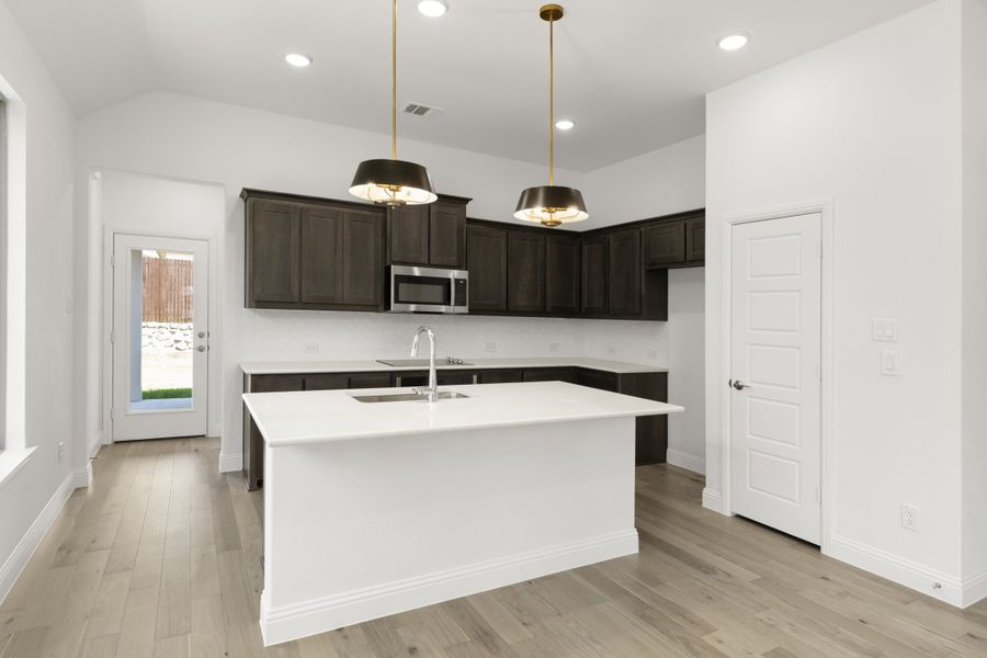 Furnished interior view inside a new home in Keeneland, Aubrey (Image 7).