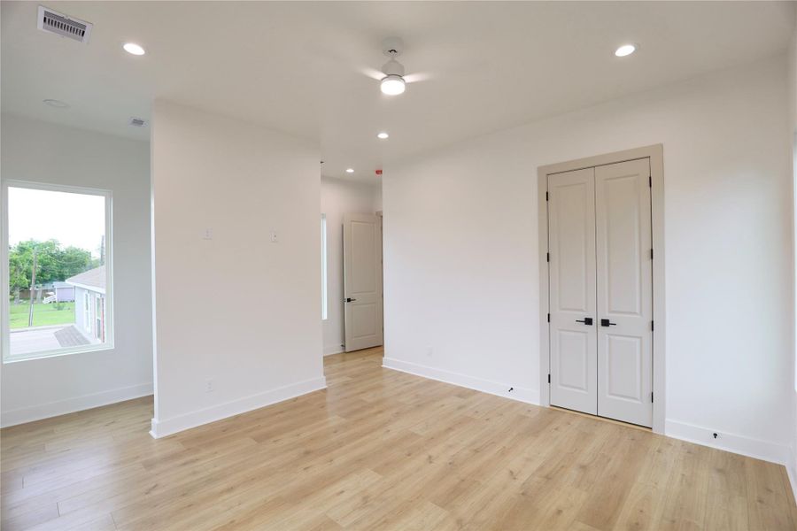 Primary Suite, spacious room with French double doors to your bath. Behind the wall is a spacious bedroom nook for remote work. Primary Suite, spacious room with French double doors to your bath. Behind the wall is a spacious bedroom nook for remote work.