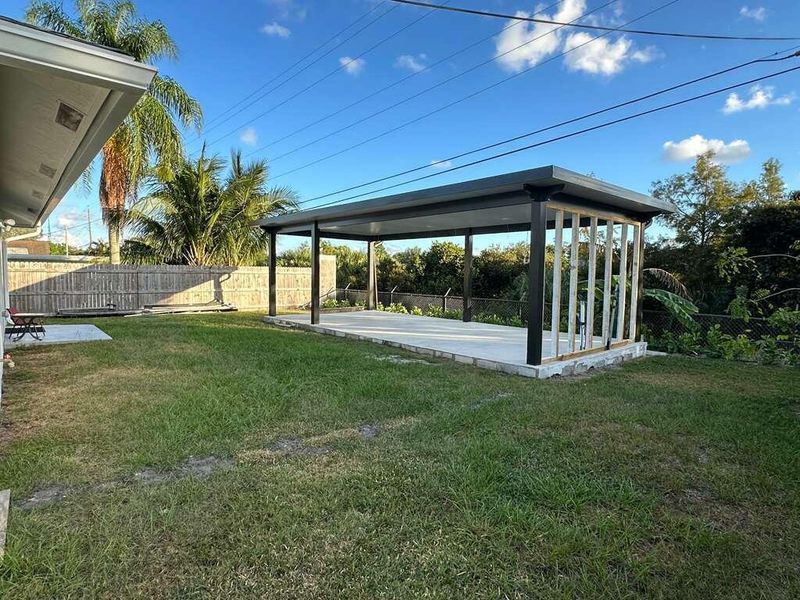 Exterior details and patio area of a home in , West Palm Beach (Image 27). Exterior details and patio area of a home in , West Palm Beach (Image 27).
