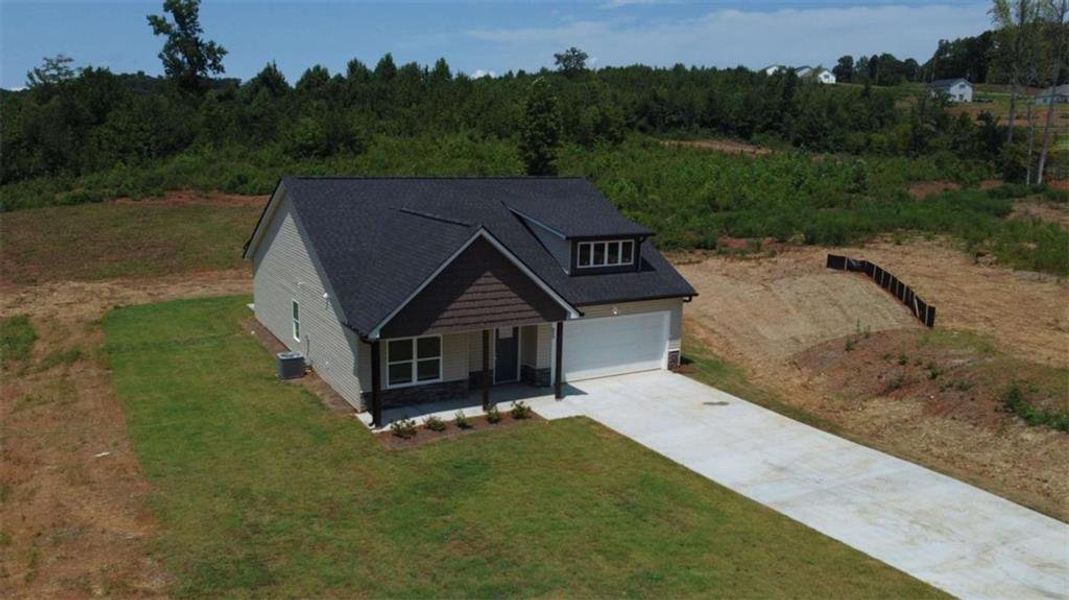 Front exterior of a new home in , Eastanollee, GA, highlighting curb appeal (Image 16).