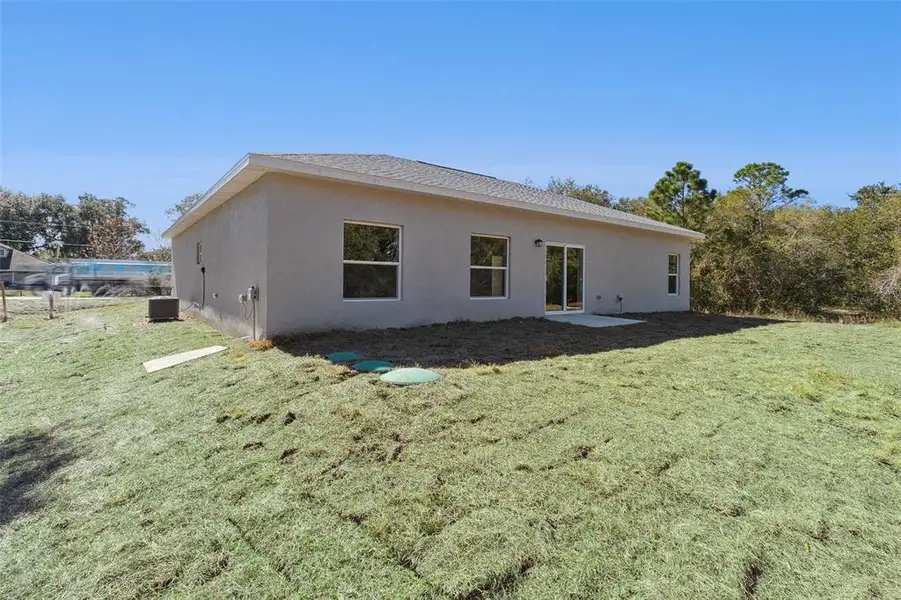 Exterior details and patio area of a home in , Yeehaw Junction (Image 3). Exterior details and patio area of a home in , Yeehaw Junction (Image 3).