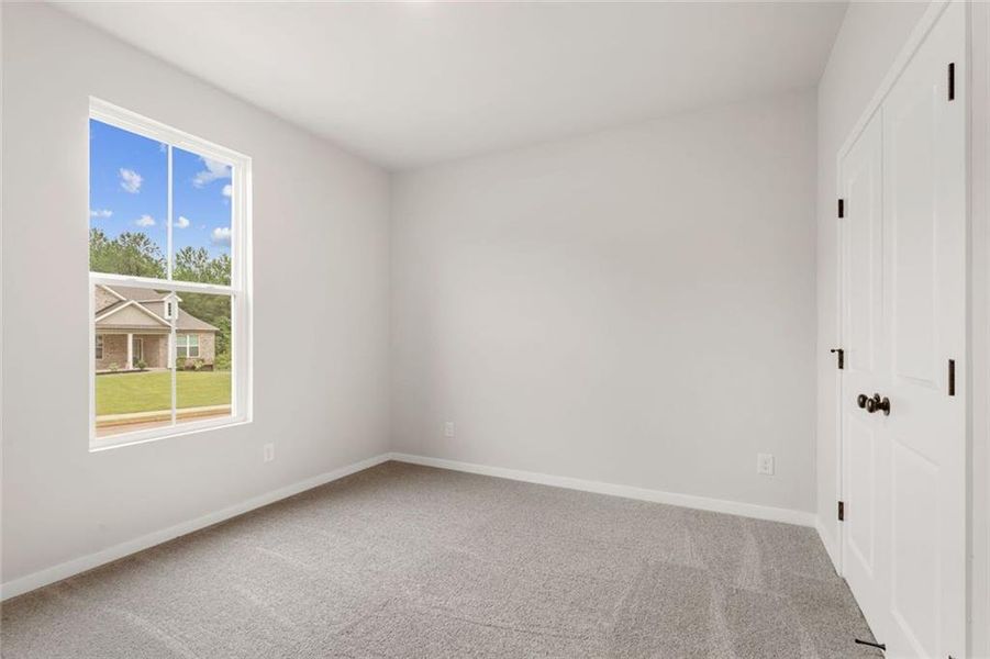 Spacious, unfurnished interior of a new home in Windsong Estates, McDonough (Image 17).