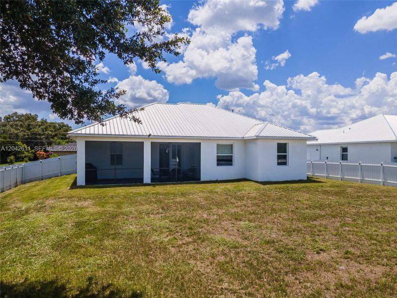 Exterior details and patio area of a home in , Lehigh Acres (Image 4).