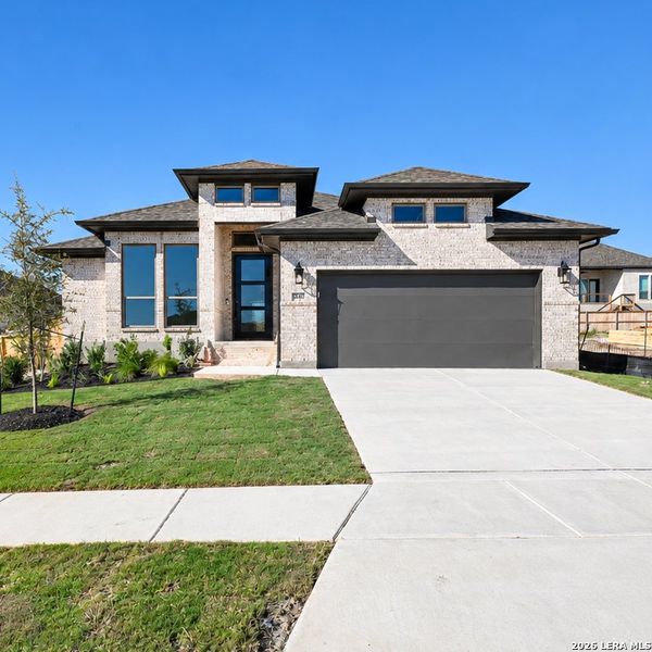 Front exterior of a new home in Mayfair, New Braunfels, TX, highlighting curb appeal (Image 22).