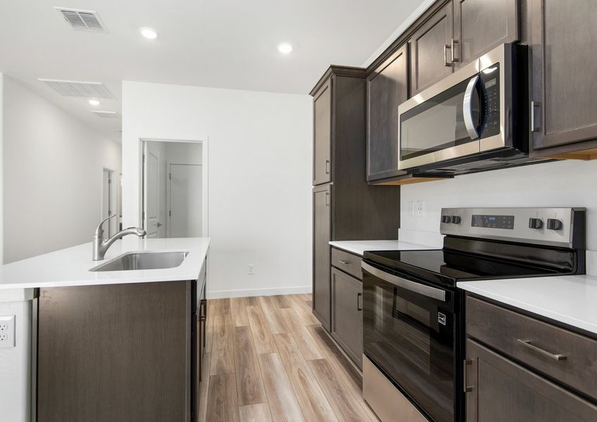 Each kitchen comes with stainless steel appliances included.
