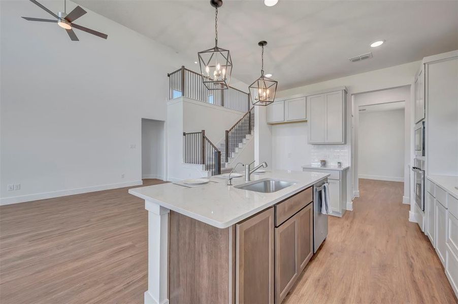 Furnished interior view inside a new home in Chaparral Park, Oak Point (Image 12).