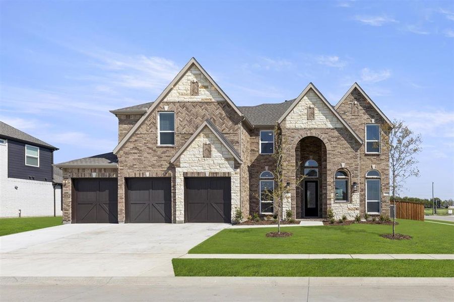 Front exterior of a new home in Polo Ridge, Mesquite, TX, highlighting curb appeal (Image 1). Front exterior of a new home in Polo Ridge, Mesquite, TX, highlighting curb appeal (Image 1).