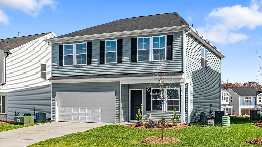 Front exterior of a new home in Bell West, Kernersville, NC, highlighting curb appeal (Image 22).