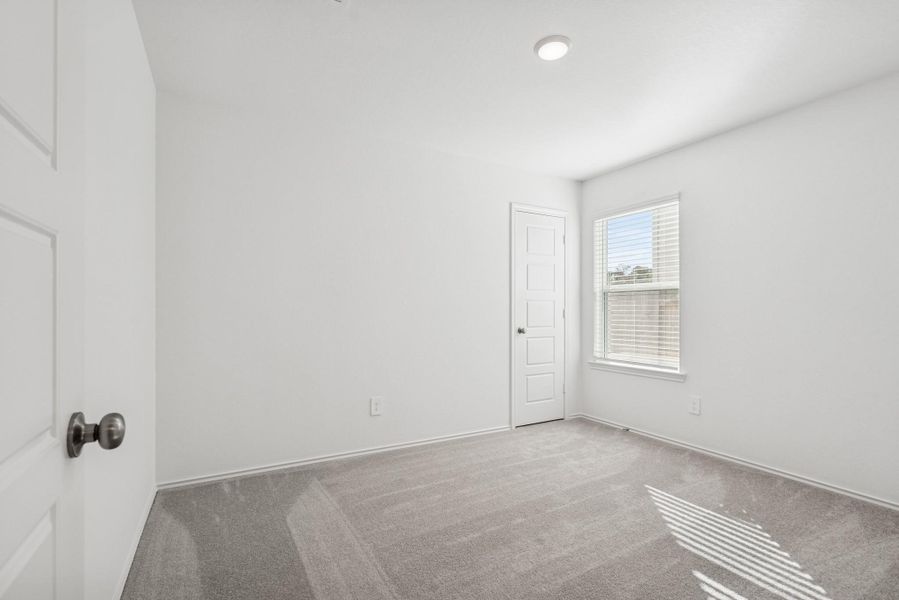 Spacious, unfurnished interior of a new home in Pinewood at Grand Texas, New Caney (Image 21). Spacious, unfurnished interior of a new home in Pinewood at Grand Texas, New Caney (Image 21).